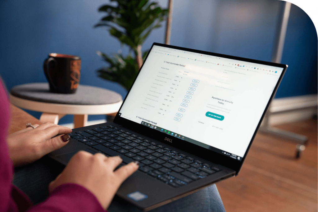 Woman on laptop using Annuity.org